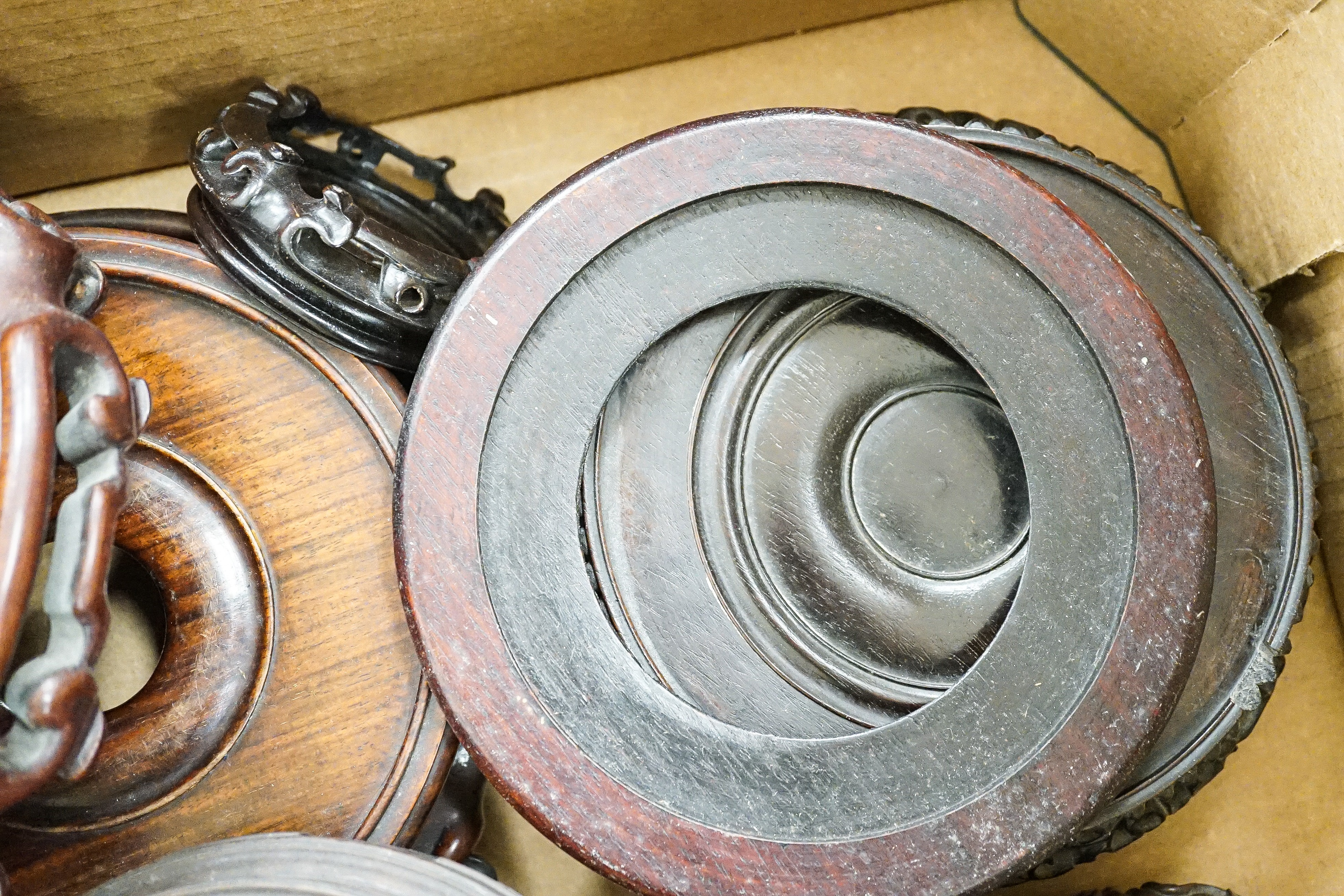 A collection of Chinese stands and bases, 1 box